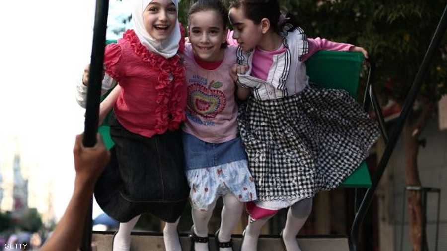 بسمات الأطفال تخفف من وطأة الحرب