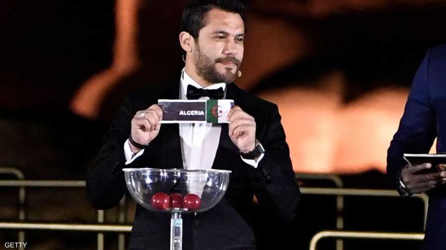 قصاصة أوقعت المنتخب الجزائري في المجموعة الثالثة إلى جانب السنغال وكينيا وتنزانيا.